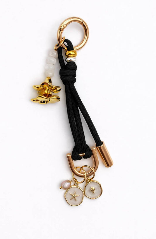 F Leo & Lei-Leo Charm – Bag & Accessory Charm (Black, Plumeria)